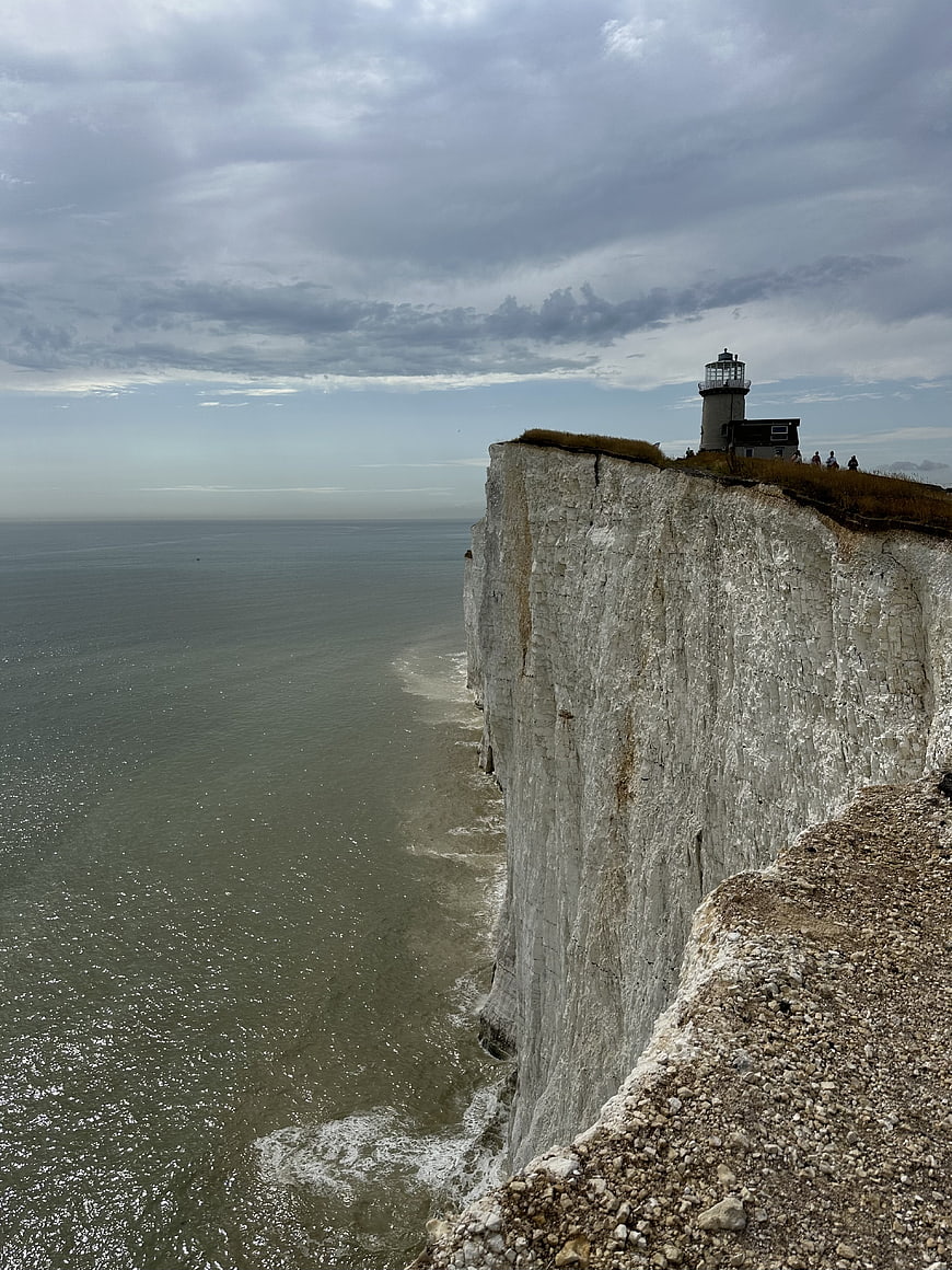 Lighthouse on White Cliffs Overlooking the Sea
