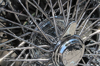 Close-up of Chrome Motorcycle Spoke Wheel Hub