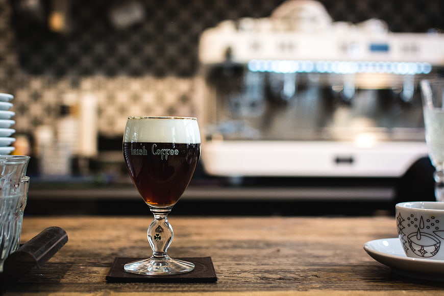 Irish Coffee in Glass at Cafe Counter