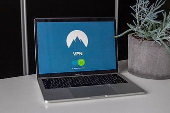 Laptop displaying VPN connection interface on desk