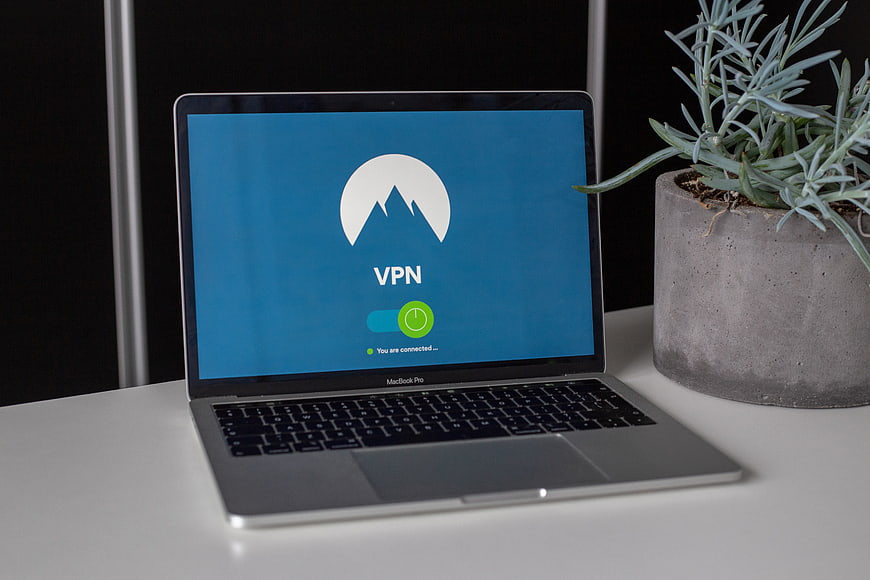 Laptop displaying VPN connection interface on desk