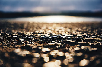 Abstract Shallow Depth of Field Pebble Beach at Sunset