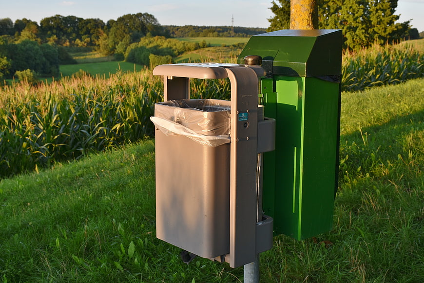Outdoor Waste Bins in Green Countryside Field