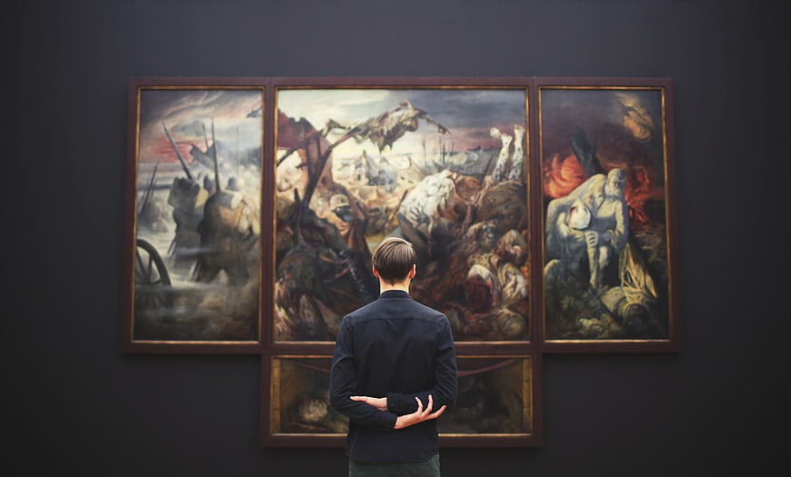 Man Viewing War Triptych Painting in Museum Gallery