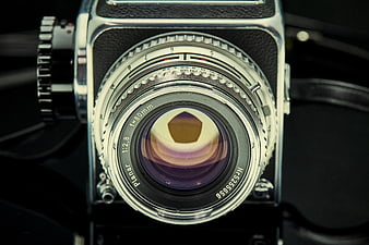Close-up of vintage Hasselblad camera lens with aperture blades