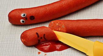 Humorous Sausage Murder Scene With Cartoon Faces And Knife