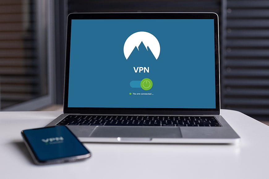 Laptop and smartphone displaying VPN connection interface