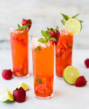 Strawberry Mint Lemonade Mocktail in Tall Glass with Fresh Garnish