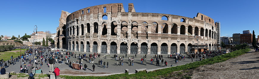 Panoramic View of the Colosseum in Rome with Tourists