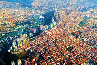 Aerial View of Urban Cityscape with Residential Blocks and River