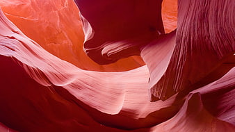 Abstract Red Sandstone Slot Canyon Walls With Flowing Textures