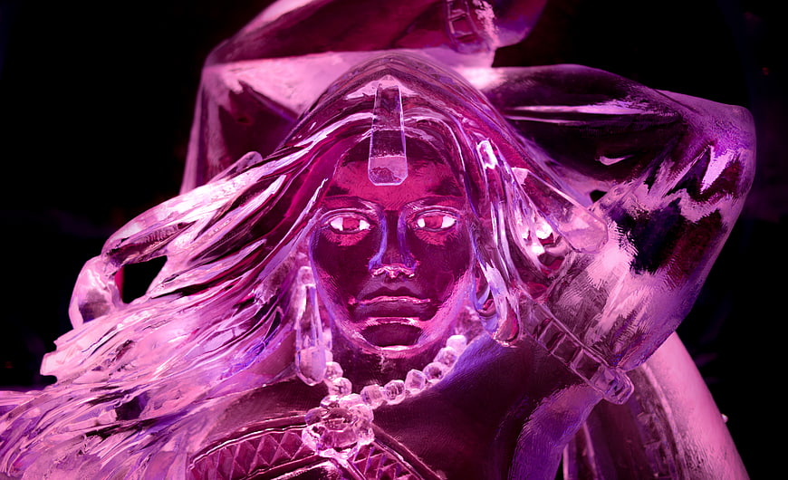 Purple Ice Sculpture of Woman with Glowing Eyes