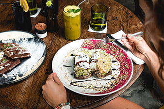 Overhead view of healthy brunch with poached eggs and smoothie