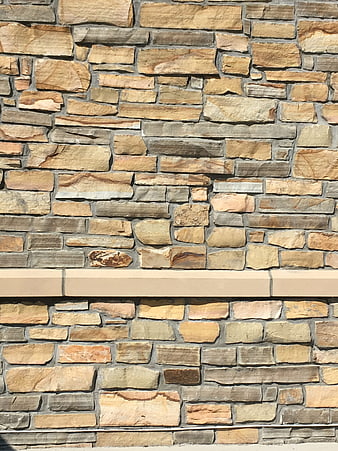 Textured Stone Wall with Horizontal Beige Band