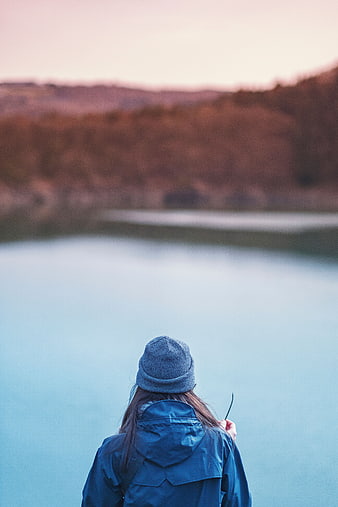 Woman in Blue Coat and Beanie Looking at Lake