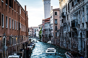 Venice Canal with Boats and Historic Architecture