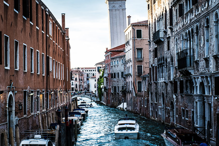 Venice Canal with Boats and Historic Architecture