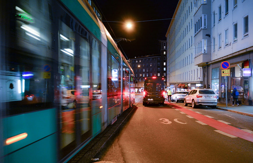 Motion blur tram on Helsinki street at night