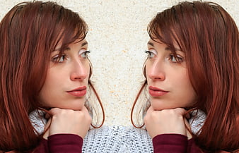 Symmetrical Portrait of Woman with Red Hair Looking Sideways