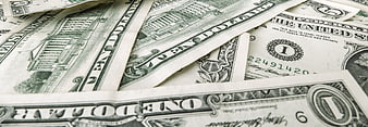 Close-up of scattered US one dollar bills