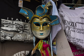Venetian carnival mask with souvenir t-shirts