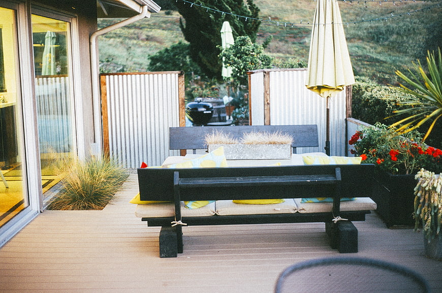 Modern Outdoor Deck with Bench and Garden Plants