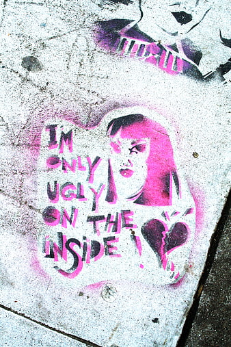 Pink Graffiti Art on Concrete Wall with Inspirational Quote