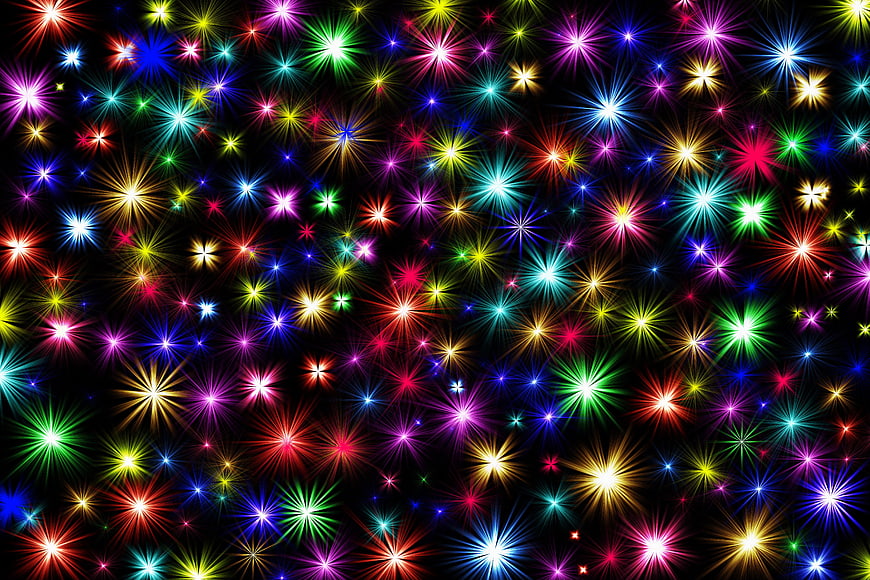 Colorful Starburst Light Effects on Black Background
