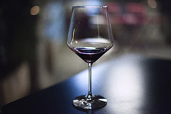 Glass of Red Wine on Dark Table