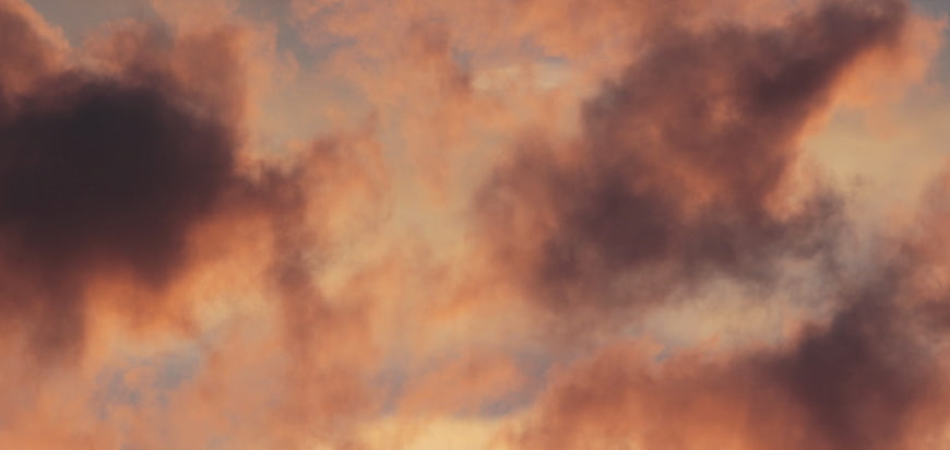 Dramatic orange and purple clouds at sunset