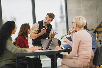 Diverse business team meeting discussion in modern office