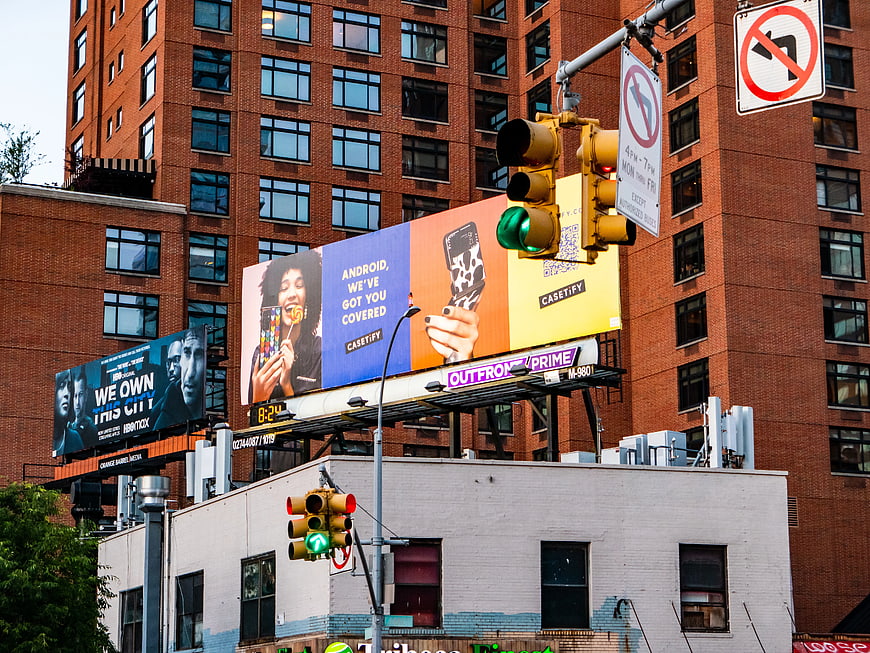 Colorful Billboards on Brick Building in Manhattan