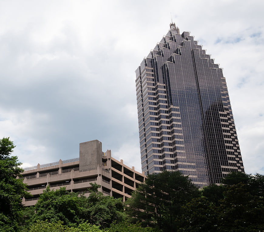 Modern Skyscraper and Parking Garage in Urban Cityscape