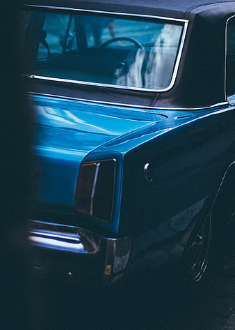 Close-up of vintage blue car rear detail