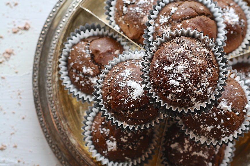 Chocolate Muffins with Powdered Sugar on Vintage Gold Tray