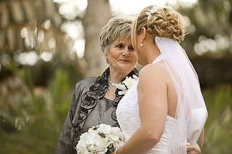 Emotional Portrait of Bride and Grandmother in Garden