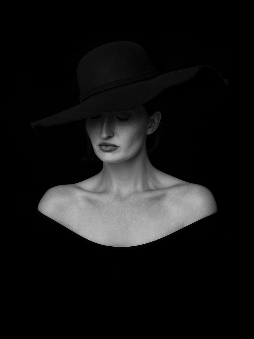 Elegant Black and White Portrait of Woman in Wide Brim Hat