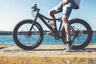 Man on Fat Tire Bike by Lake