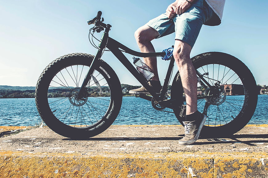 Man on Fat Tire Bike by Lake