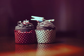 Two Chocolate Cupcakes with Polka Dot Wrappers