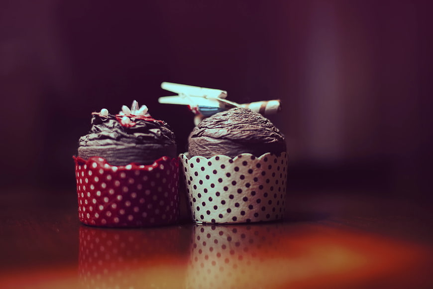Two Chocolate Cupcakes with Polka Dot Wrappers