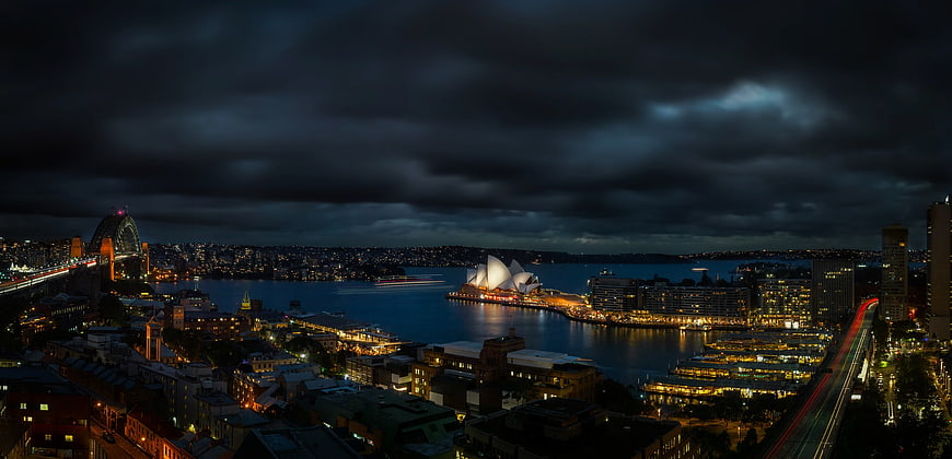 Panoramic Night View of Sydney Opera House and Harbor Bridge