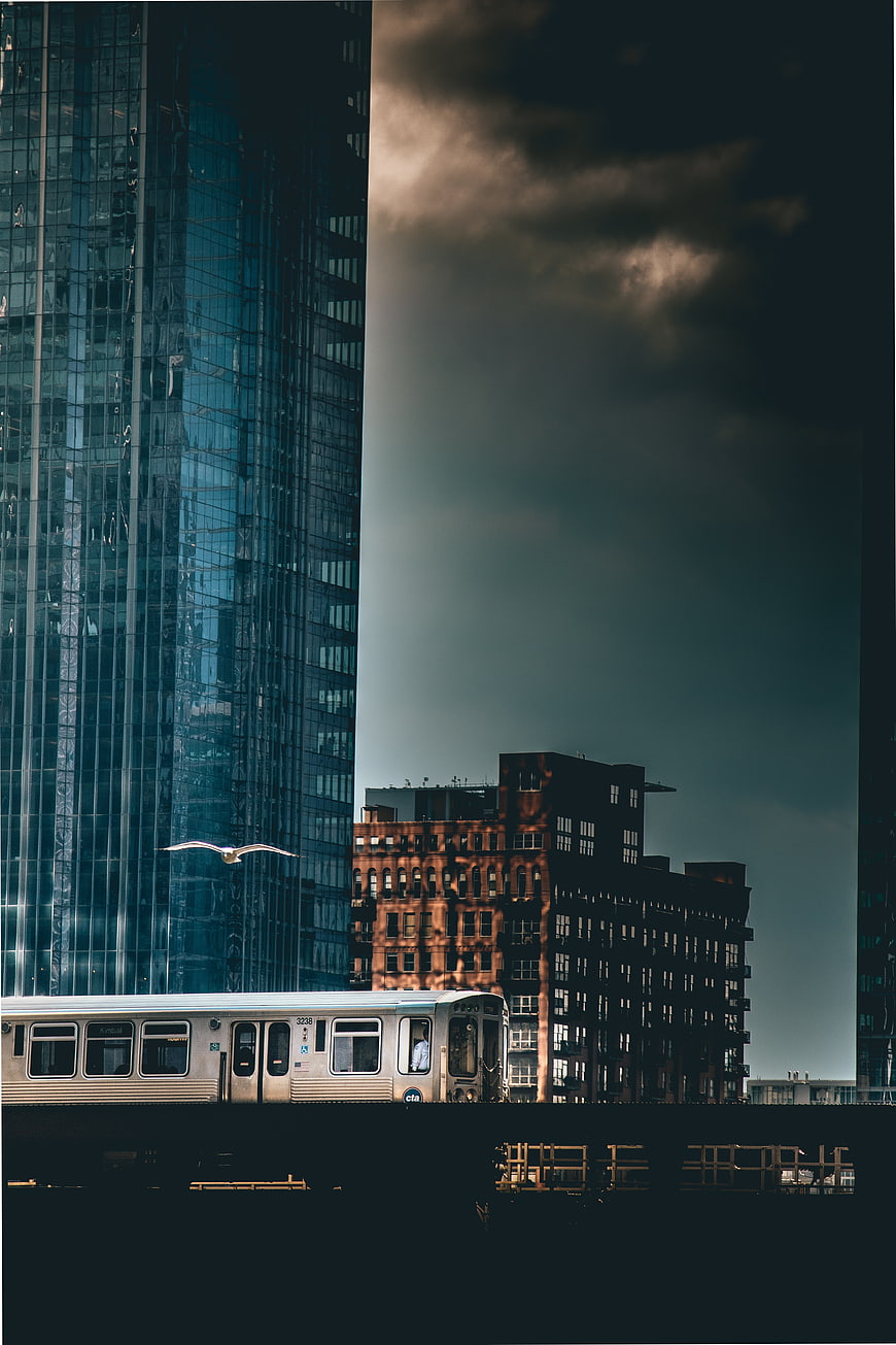 Cinematic Urban Skyline with Subway Train and Skyscraper