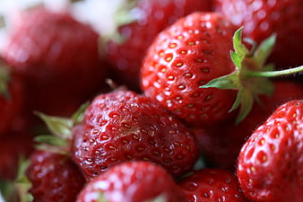 Close-up of fresh red strawberries with seeds