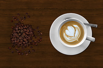 Top View of Latte Art Coffee Cup and Scattered Beans on Wood