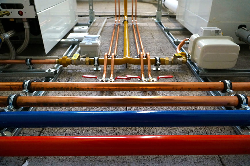 Copper and colored pipes in industrial heating system