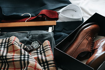 Men's fashion accessories and clothing flat lay with brown leather shoes