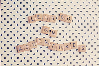 Scrabble Tiles Spelling Lets Go On Adventures On Polka Dot Background