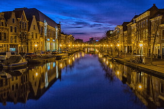 Blue hour canal view in Leiden, Netherlands with reflections