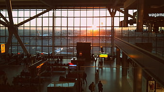 Sunset View Through Airport Terminal Windows